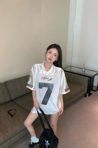 Real shot of white pearlescent fabric T-shirt top summer sports jersey
