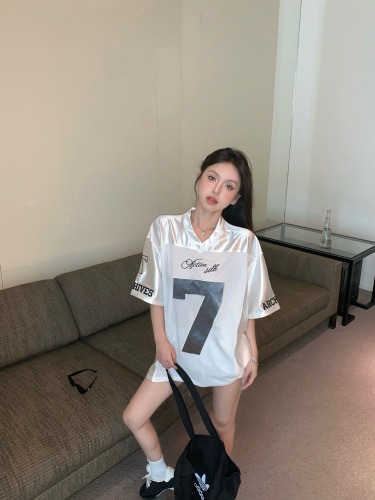 Real shot of white pearlescent fabric T-shirt top summer sports jersey
