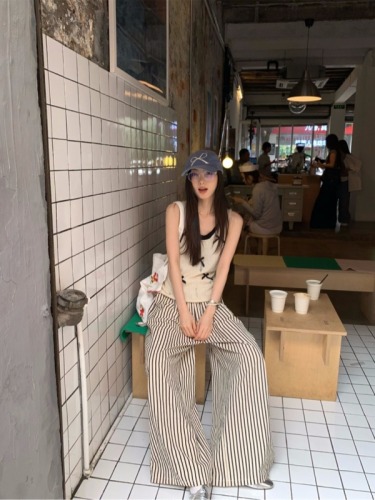 Actual shot of Korean distressed and worn fake two-piece bow knitted vest and striped pants suit