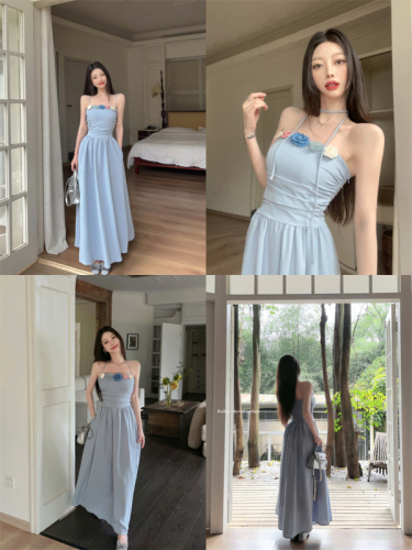 Real shot of beautiful pure lust flower suspender dress for women on seaside vacation, slim waist and French style long skirt