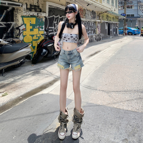 Real shot of summer light-colored ripped denim shorts for women with pear-shaped body, high waist, slimming, versatile A-line hot pants shorts