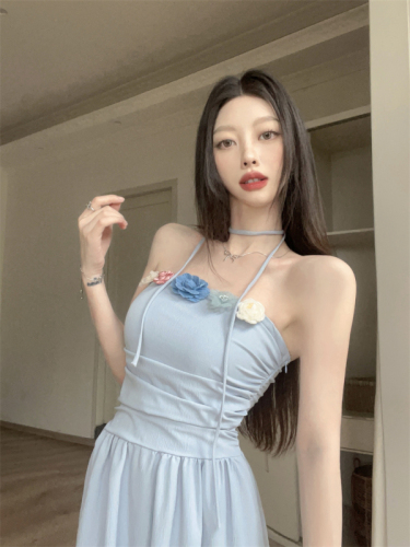 Real shot of beautiful pure lust flower suspender dress for women on seaside vacation, slim waist and French style long skirt