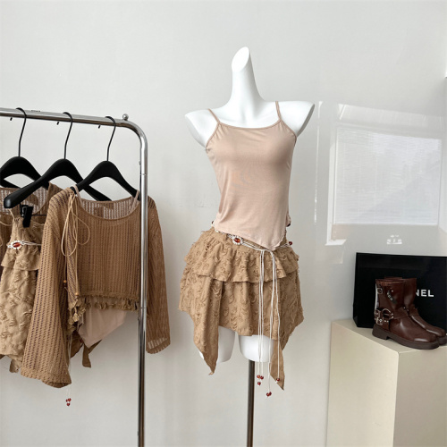 Work overtime wasteland style suit hollow blouse top for women to wear in summer with a complete set of irregular skirts