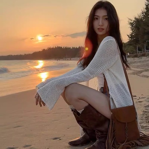 Hollow outer wear sun protection design sweater early spring and autumn new slim long-sleeved niche lace-up cardigan jacket for women