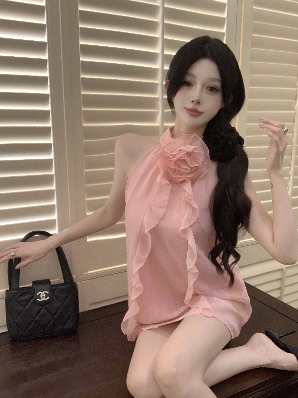 Real shot of elegant halterneck vest with design of three-dimensional flowers and ruffled sleeveless top vest for women