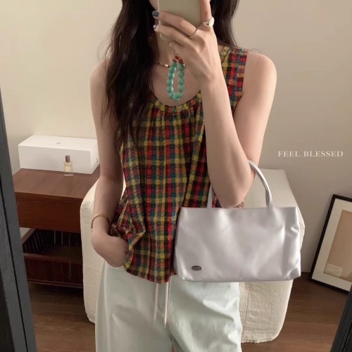 The color is absolutely brilliant~Korean version of colorful plaid contrasting U-neck fashionable age-reducing and slimming summer sleeveless vest top for women