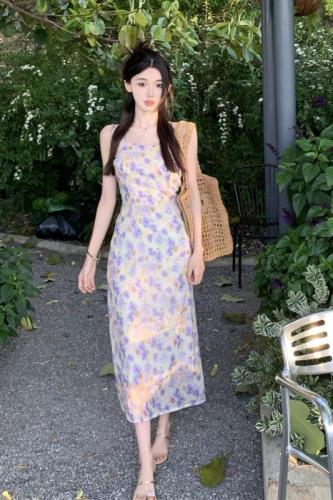 Real shot of French-style floral suspender dress with summer design and slimming holiday style long skirt