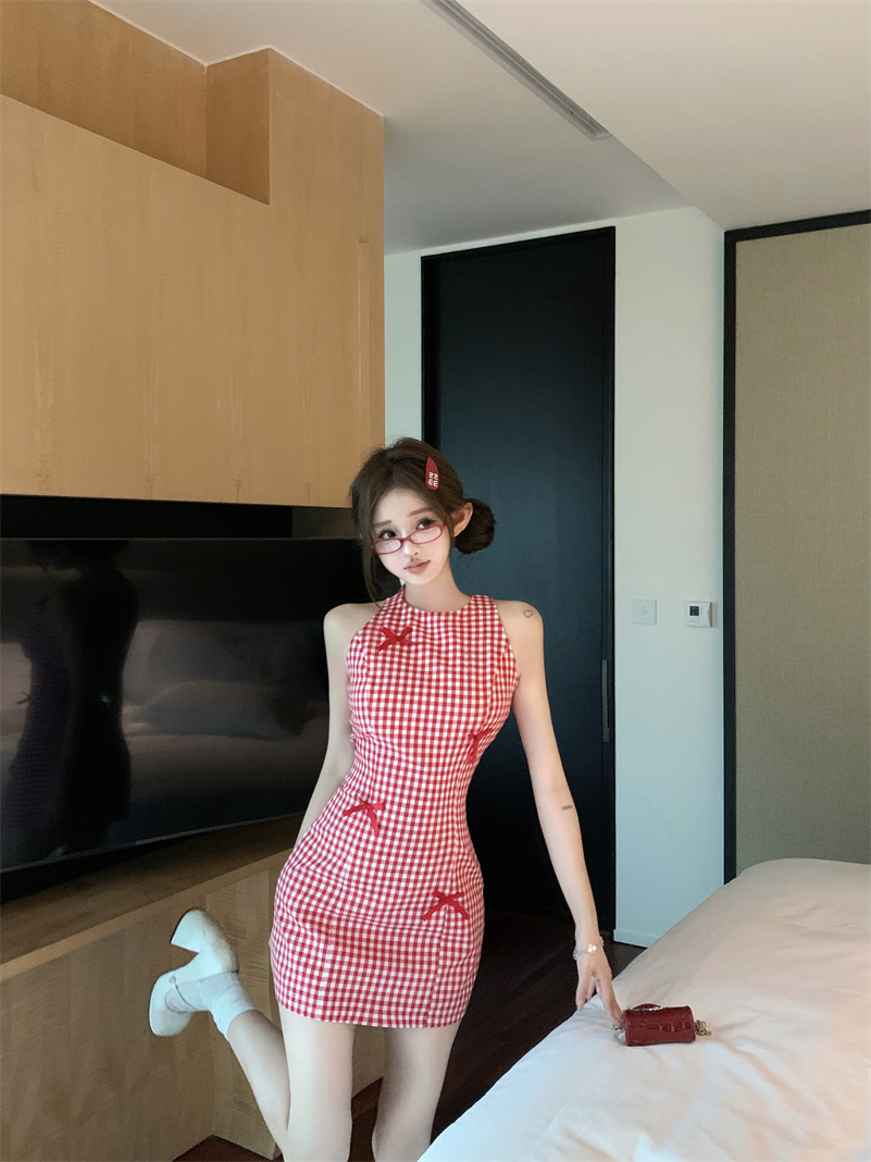 Real shot of women's plaid bow waisted tank top short skirt