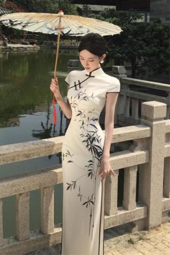 Real shot of Chinese style improved short-sleeved cheongsam dress long style