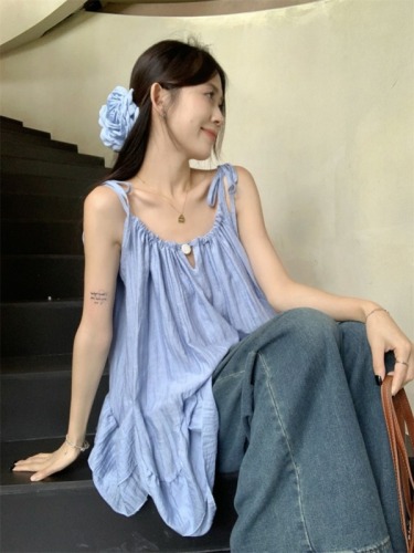 Actual shot of fresh ruffled round neck A-line suspender top for women in seaside resort style