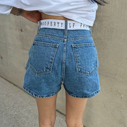 Loose casual denim shorts with buttoned monograms