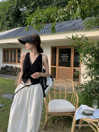 Chic black knit cardigan with spaghetti straps for women, 2024 summer versatile, unique and eye-catching short-sleeve top, trendy.