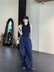 The universal and versatile king, minimalist and comfortable knitted racer vest worn as a sleeveless halter top