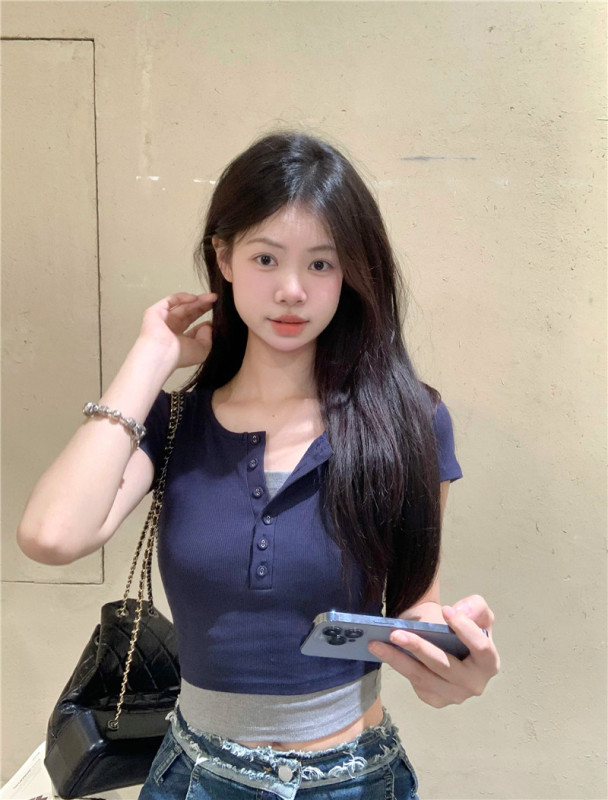 Real shot of two fake dark blue short-sleeved T-shirts designed by Millennial Hot Girl