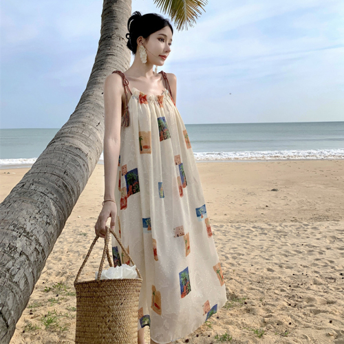 Tea break French high-end sexy seaside vacation floral suspender dress for women summer super fairy loose beach long dress