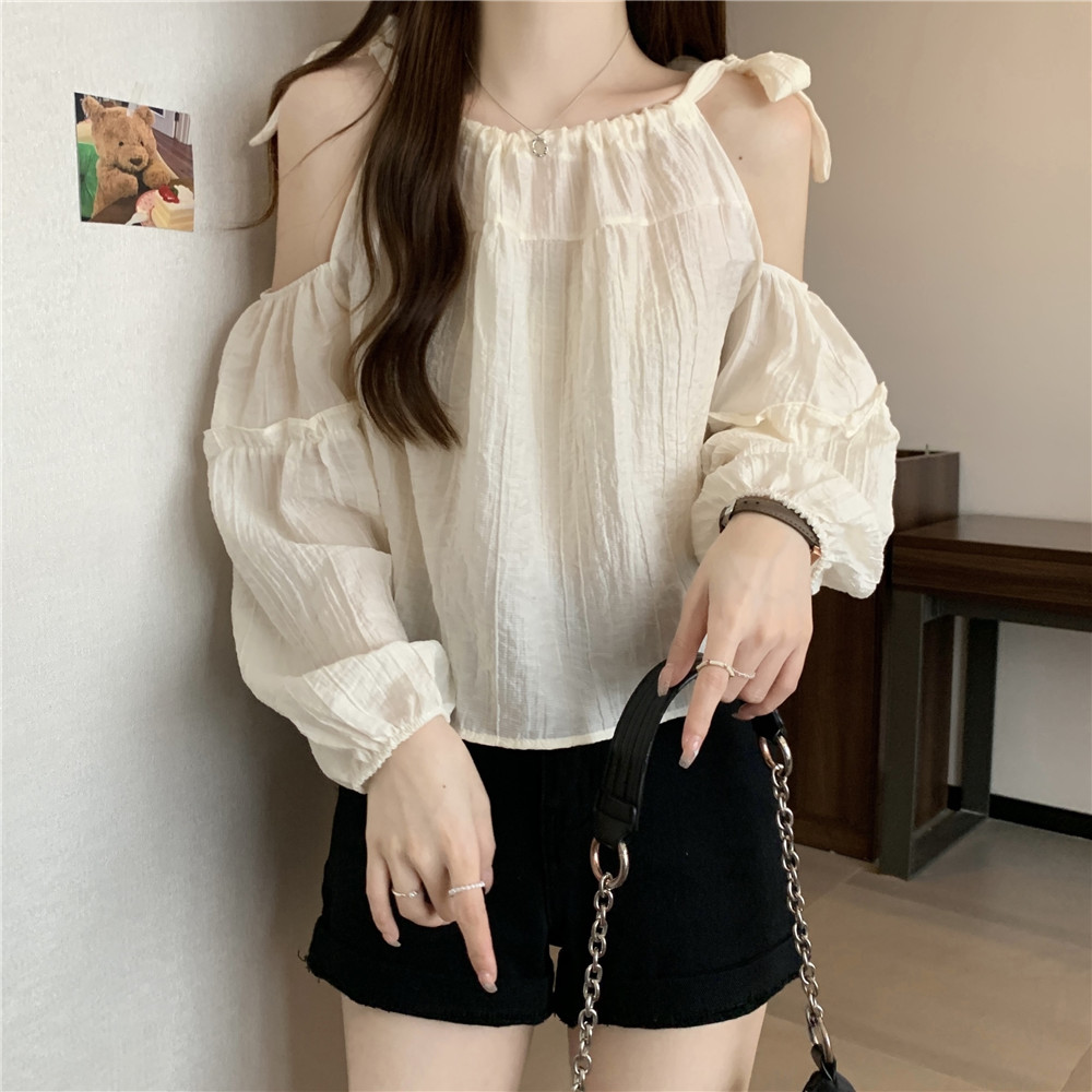 Wrinkled textured off-shoulder suspender French shirt for women summer 2024 new loose short sun protection versatile top