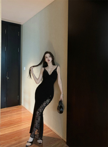 Real shot of hot girl with deep V slim fit and high slit long dress