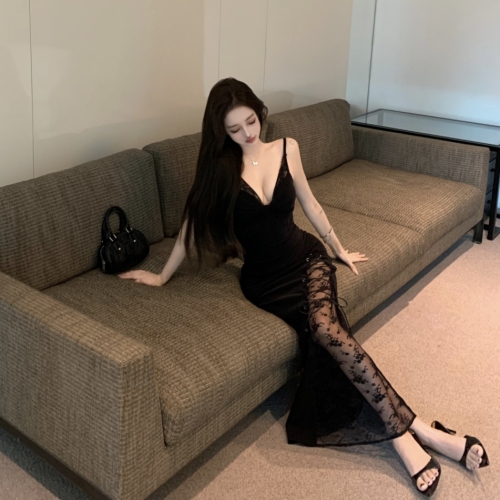 Real shot of hot girl with deep V slim fit and high slit long dress