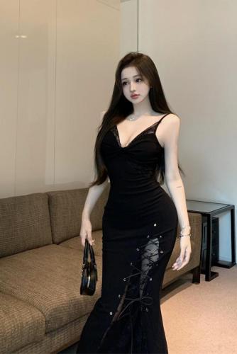 Real shot of hot girl with deep V slim fit and high slit long dress