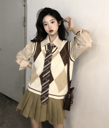 Sweet and spicy long-sleeved retro striped new shirt and tie + V-neck sweater horse + versatile and versatile short skirt for women