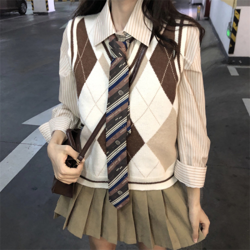 Sweet and spicy long-sleeved retro striped new shirt and tie + V-neck sweater horse + versatile and versatile short skirt for women