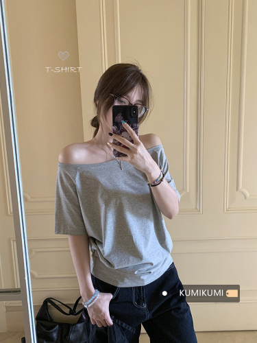 Fashionable sloping shoulder design loose solid color design T-shirt for women summer short-sleeved temperament simple off-shoulder top