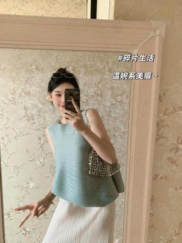 Deng Xiaoma custom-dyed white and elegant Miyake style suit lazy sleeveless vest top pleated tassel skirt for women