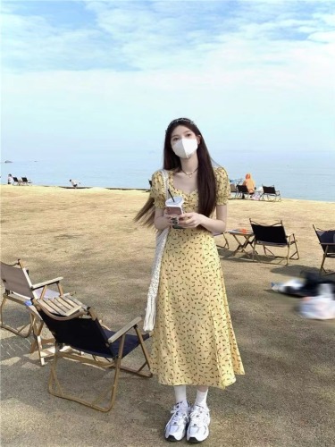 French yellow floral dress women's spring new high-waist slim slit skirt A-line mid-length skirt