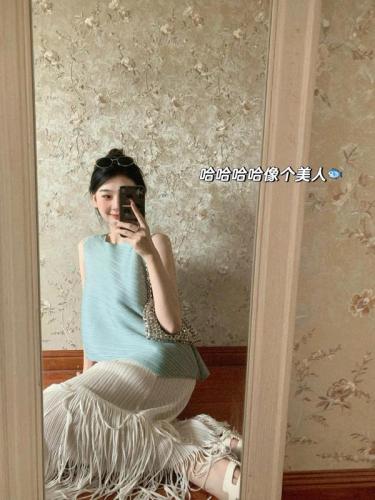 Deng Xiaoma custom-dyed white and elegant Miyake style suit lazy sleeveless vest top pleated tassel skirt for women