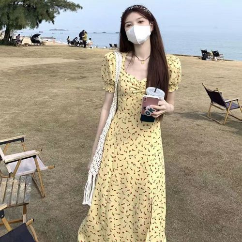 French yellow floral dress women's spring new high-waist slim slit skirt A-line mid-length skirt