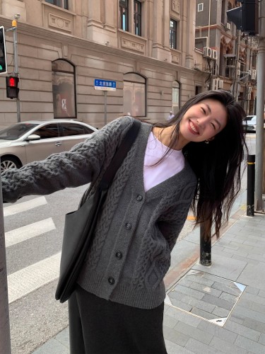 Gentle and lazy style twist v-neck knitted cardigan for women to wear in autumn and winter new Korean style loose sweater jacket top