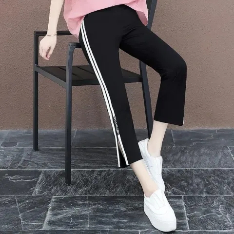 High waist slit sweatpants for women 2024 spring and summer side striped harem pants slimming large size elasticated eight-point casual pants