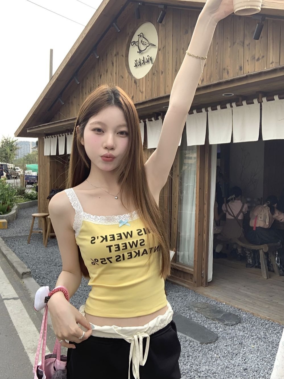 Actual shot of three-label yellow lace stitching letter printing short suspender top for women