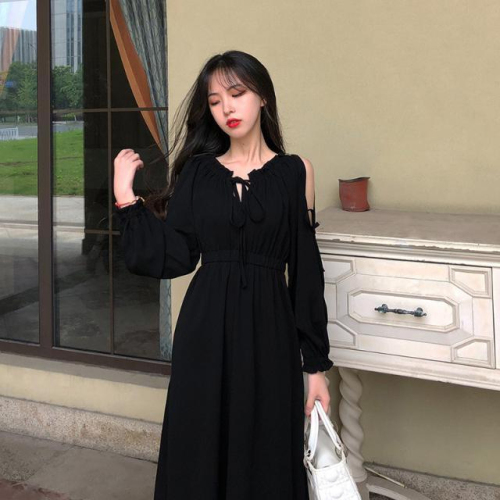 Spring and Autumn high-end generous hollow one-shoulder skirt 2024 new long-sleeved long skirt with lace-up puff sleeves holiday travel trend