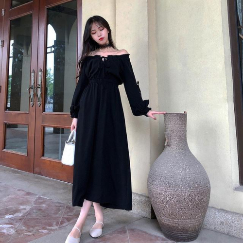 Spring and Autumn high-end generous hollow one-shoulder skirt 2024 new long-sleeved long skirt with lace-up puff sleeves holiday travel trend