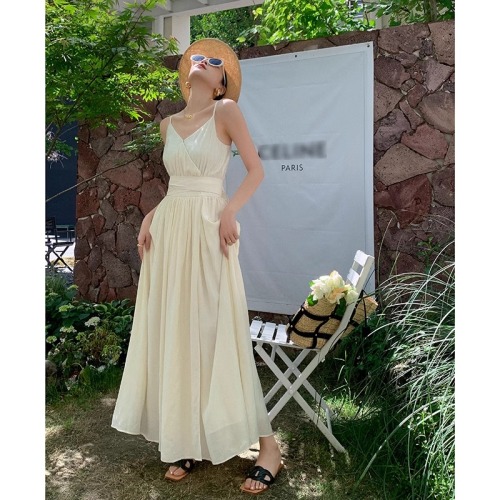 High-end light luxury celebrity light apricot suspender dress summer 2024 new style waist slimming holiday long skirt