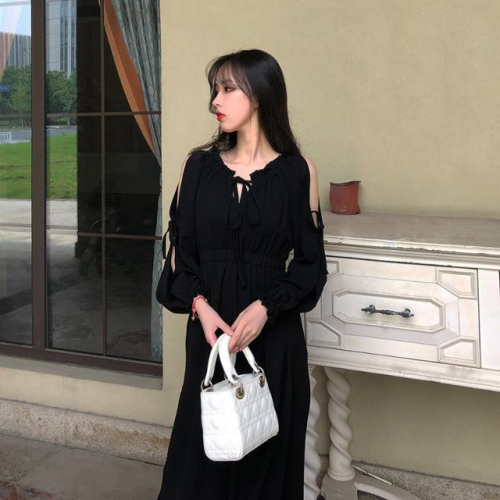 Spring and Autumn high-end generous hollow one-shoulder skirt 2024 new long-sleeved long skirt with lace-up puff sleeves holiday travel trend