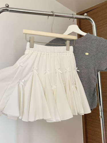 A little white dress that feels like first love!  Pure lust style small bow skirt women's summer slim elastic waist A-line skirt