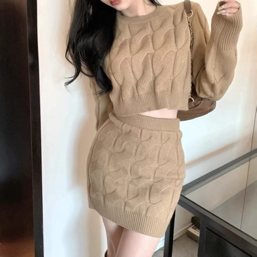 Autumn and winter Internet celebrity same style knitted sweater suit for women slim-fitting thickened long-sleeved twist high waist hip-covering short skirt two-piece set