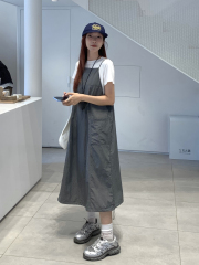 snapping photos of a versatile white T-shirt paired with a utility quick-dry large pocket, ribbed ankle-length drawstring halter dress set