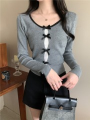 Shot in real life, this small Chanel-style knitted sweater features a design sense butterfly bow lace hollow long-sleeved women's knitted sweater.