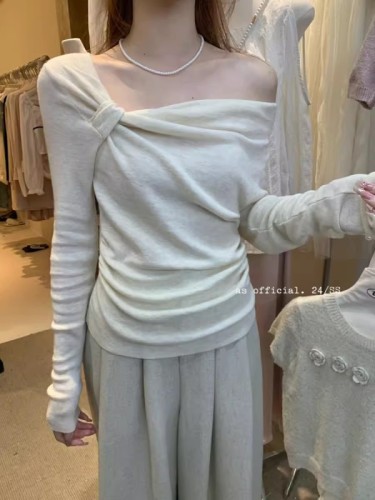 2024 spring and autumn new smocked irregular design niche thin knitted sweater women's long-sleeved top