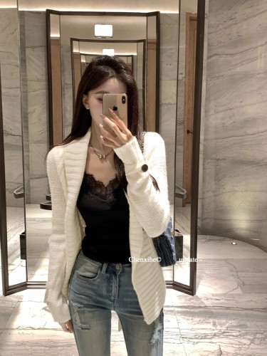 He Chenxi early spring lazy white lapel wide pit belt knitted cardigan women's loose long-sleeved sweater jacket