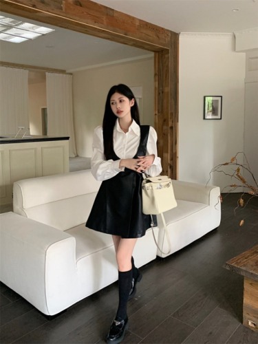 Actual shot of Korean style fashion puff sleeve shirt, temperament PU leather, chic niche suspender skirt two-piece set