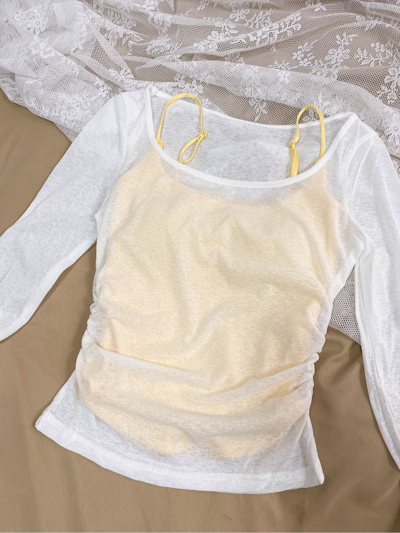 Official photo: Creamy yellow suspender women's summer blouse paired with a complete set of sun protection T-shirts and thin tops