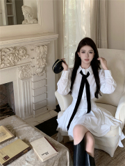 Photographed: Chic and Elegant White Long-Sleeve Shirt Dress with Belted Slimming Skirt