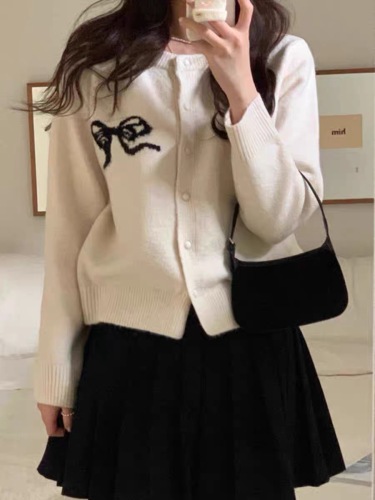 South Korea's Dongdaemun new solid color sweet age-reducing bow round neck jacquard sweater knitted cardigan jacket for women