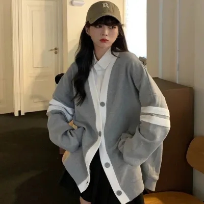 Korean college style contrasting color splicing cardigan single-breasted loose lazy style long-sleeved sweater women's top coat autumn