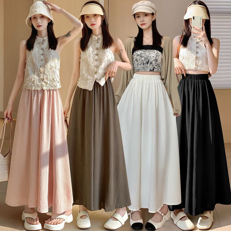 Spring and summer new cotton and linen casual wide-leg pants, feminine, loose, drapey and elegant nine-point pleated pants skirt