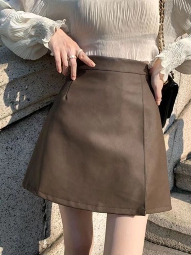 Spring and Autumn small ins leather skirt black skirt women's high-waisted A-line slimming versatile hip-covering slit short skirt winter